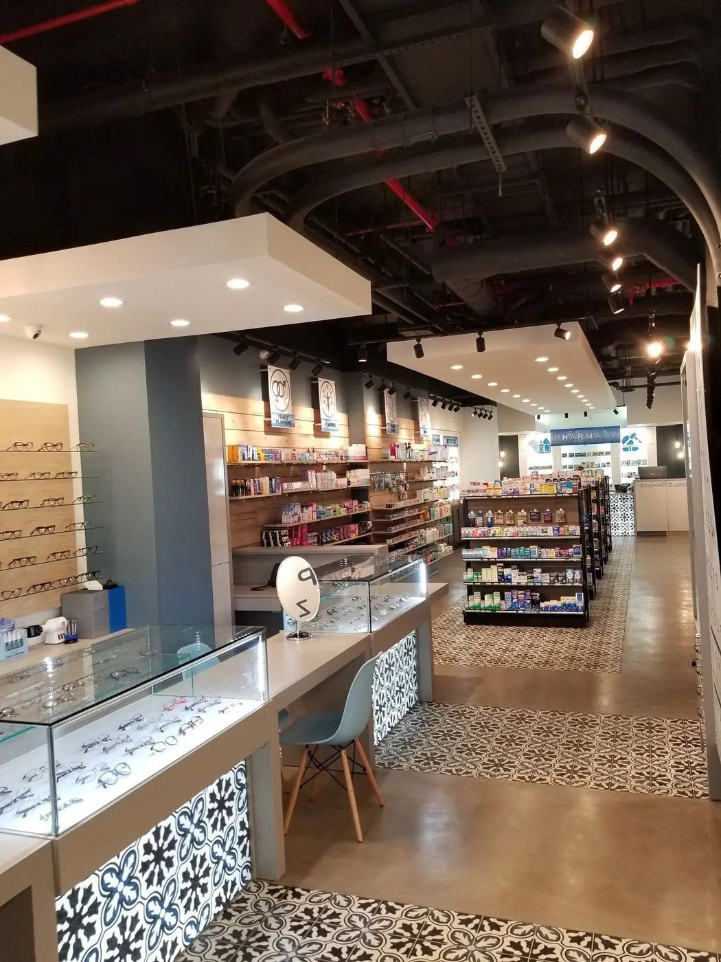 Finished pharmacy display counter with pendant lighting in Downtown Brooklyn