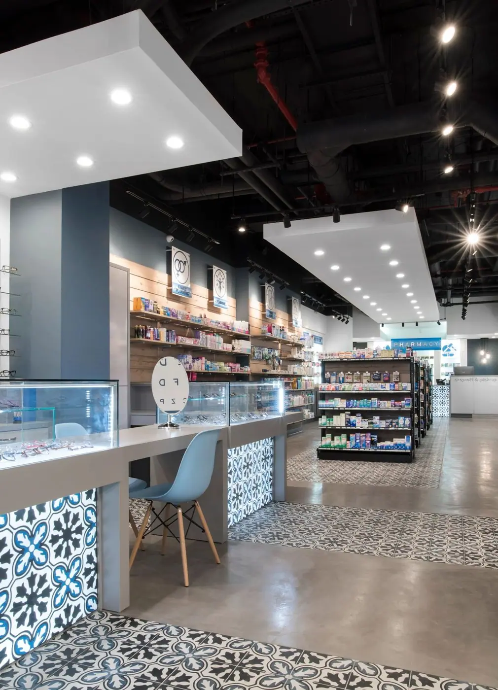 Finished pharmacy sales floor with shelving and custom millwork in Downtown Brooklyn