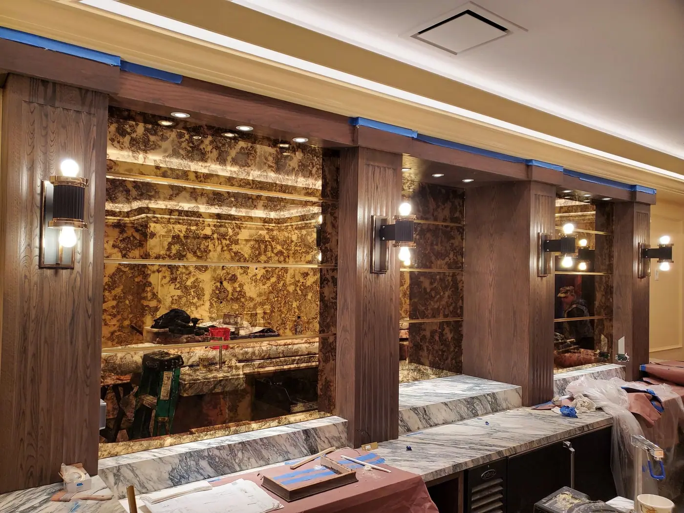 Backlit onyx feature wall being installed in an Upper East Side restaurant