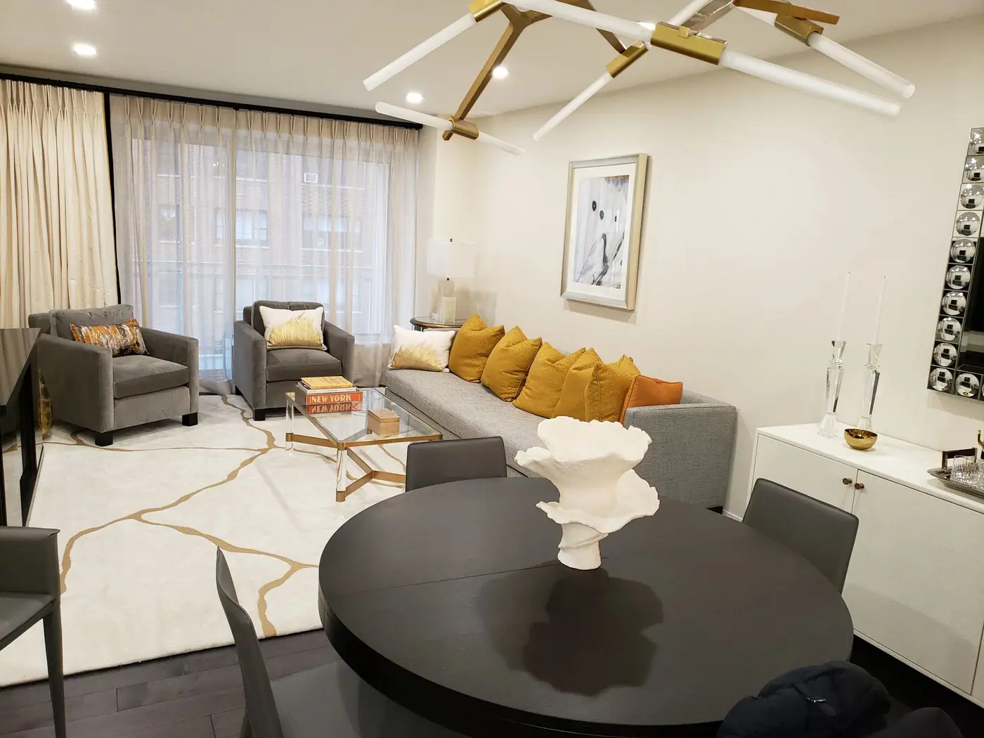 Finished living and dining space in the Sutton Place condo renovation